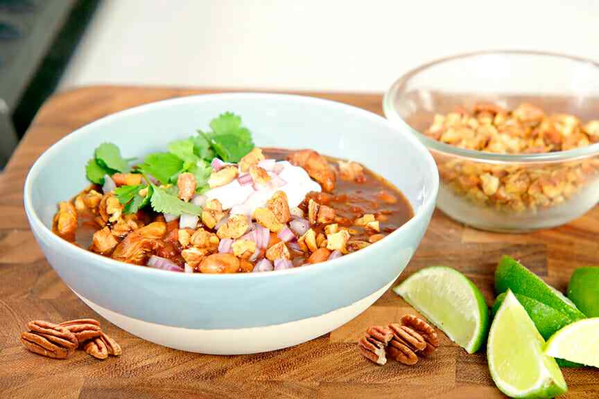 Leftover Turkey Chili Topped with Chili-Toasted Pecans